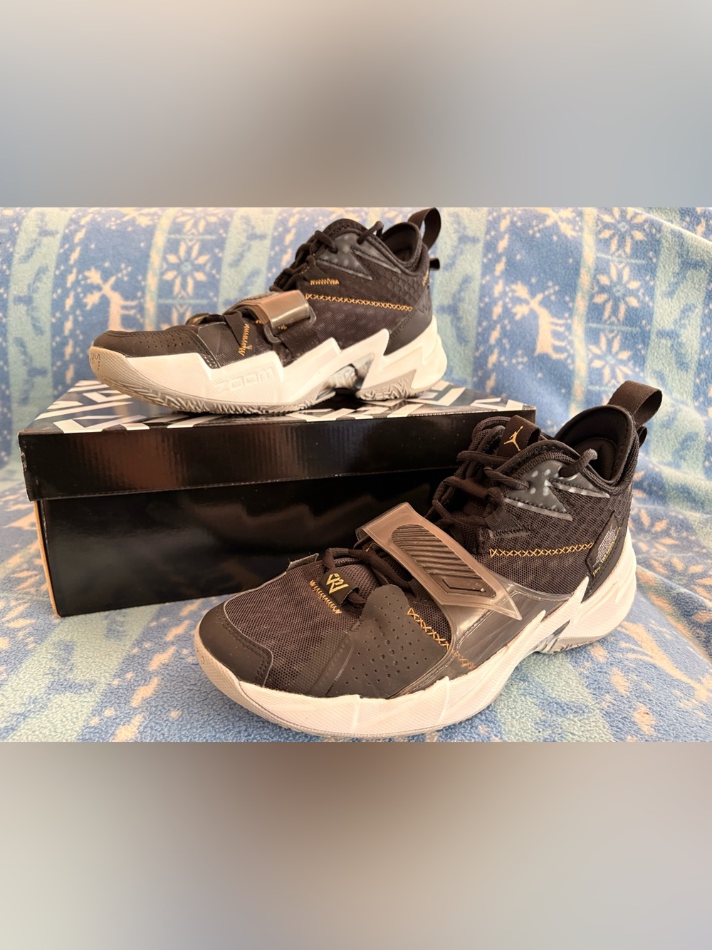 Jordan why not zero.3 Black and Gold Basketball Sneakers